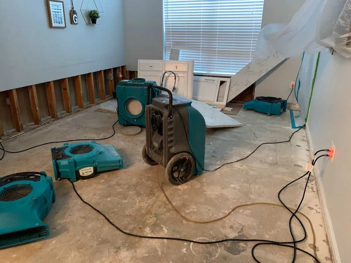 Dehumidifier in flood-cut room for Water Damage Restoration in Mundelein